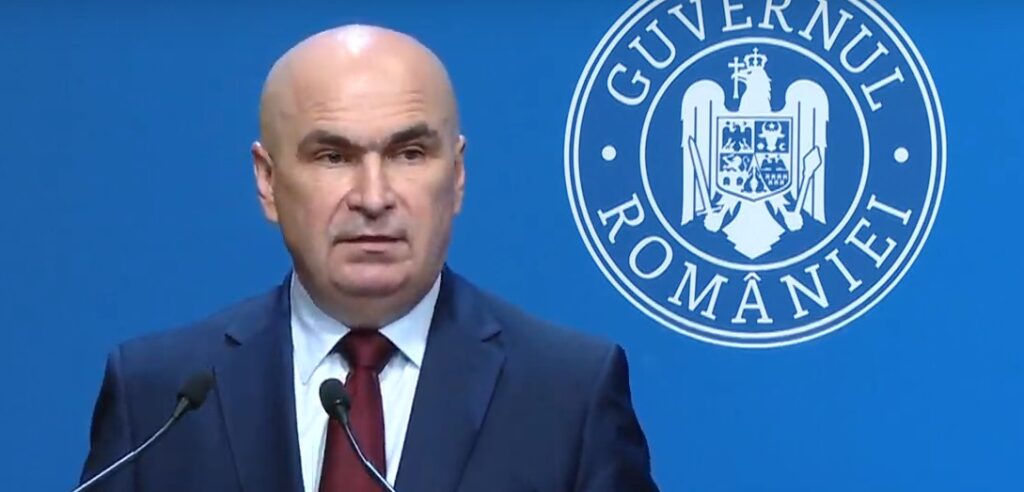 bolojan:-tva-va-fi-reasezata-la-doua-praguri.-bancile,-impozitate-suplimentar