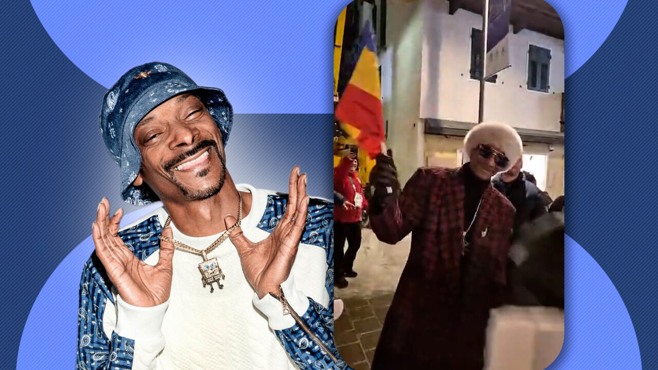 celebrul-artist-snoop-dogg,-filmat-in-timp-de-flutura-un-steag-al-romaniei-la-jocurile-olimpice-de-iarna-de-la-milano-cortina
