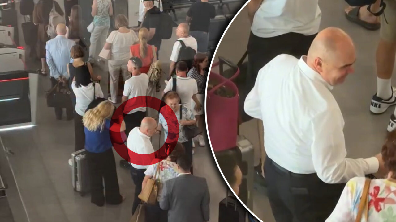 Ilie Bolojan, văzut la coada de îmbarcare în Aeroportul Oradea